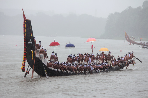 Aranmula,India-September 14, 2011:A team of oarsmen wearing traditional dress participate in the most popular Aranmula boat race