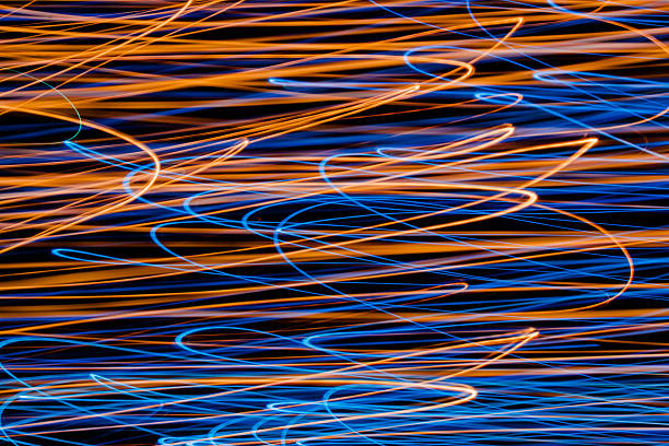 istock Abstract background. Long exposure settings to blue and yellow lights 624028418