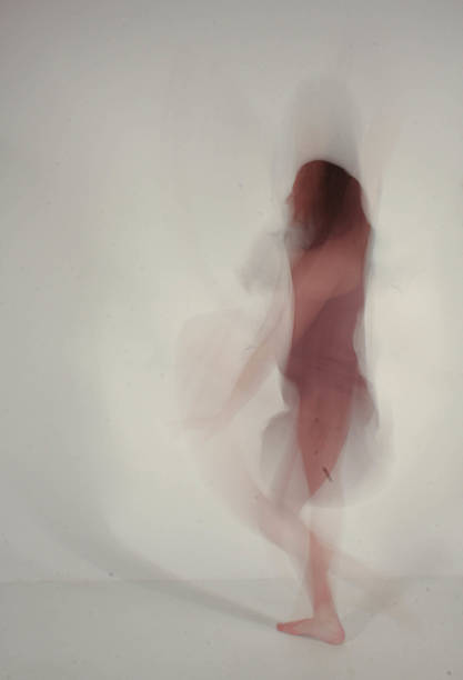 istock Young woman dancing in studio ilusion 624030572