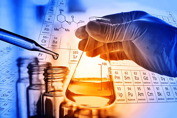 istock Flask in scientist hand with laboratory background 624033172