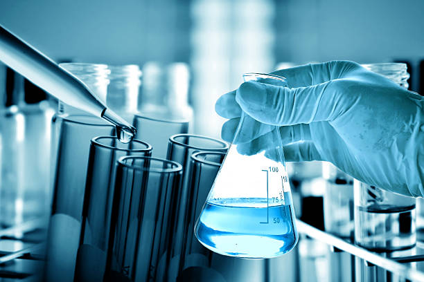 istock Flask in scientist hand, science research concept 624033292