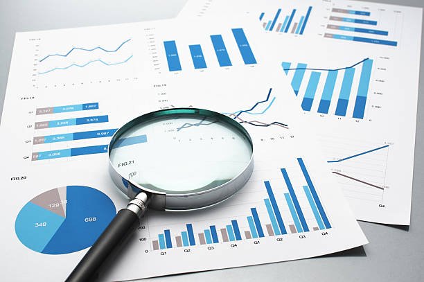 istock Reviewing business reports. Graphs and charts. 624034168