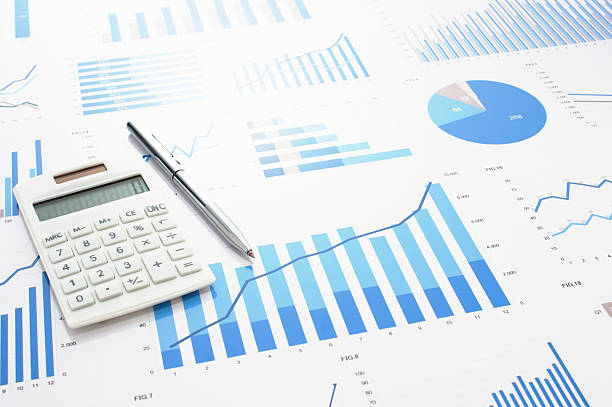 istock Accounting data, charts, calculator and pen. 624034650
