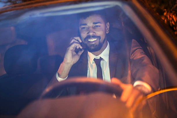 istock Businessman driving car 624047598