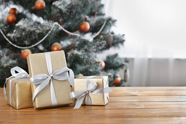 istock Christmas present on decorated room background, holiday concept 624063880