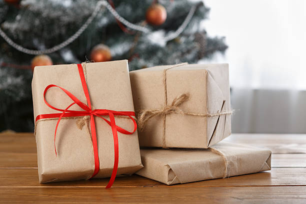 istock Christmas present on decorated room background, holiday concept 624064166