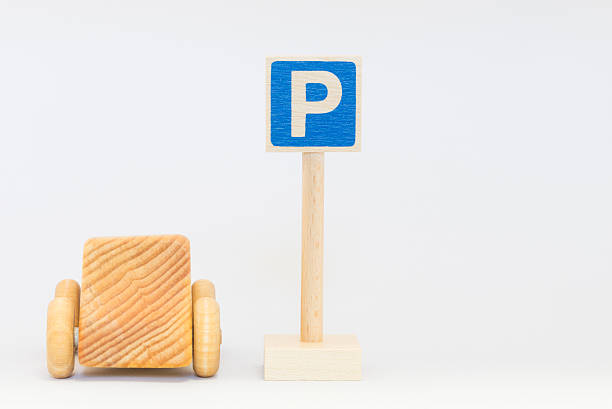 istock Traffic sign and wooden car 624064362
