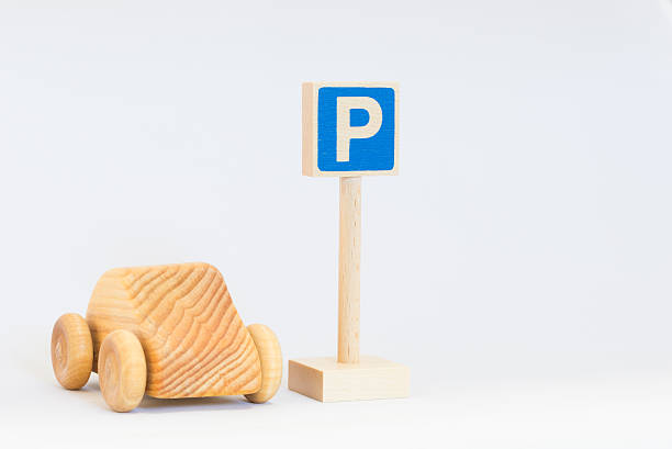 istock Traffic sign and wooden car 624064392