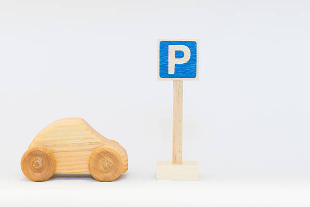 istock Traffic sign and wooden car 624064536