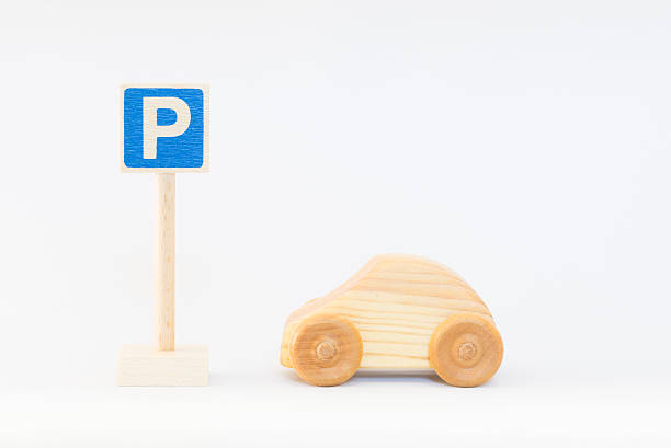 istock Traffic sign and wooden car 624064564