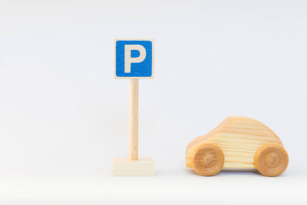 istock Traffic sign and wooden car 624064592
