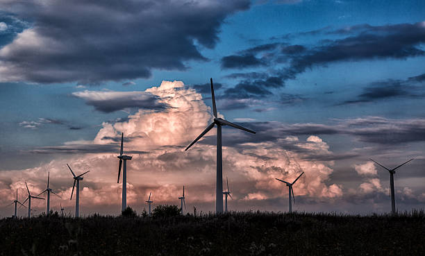 istock wind turbines in a field 624067686