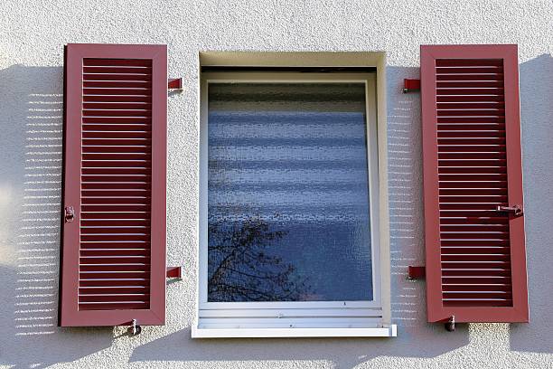 window with folding shutter - klappläden imagens e fotografias de stock