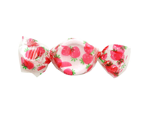 istock sweet coloured strawberry candy isolated. clipping path 624084788