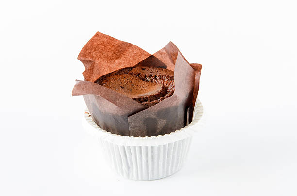 istock Delicious chocolate muffin on white background witch copy space 624085114