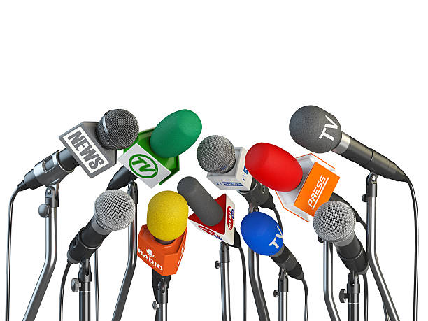 istock Microphones prepared for press conference or interview isolated 624086222