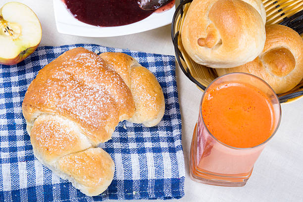 croissant, juice, bagels and jam, breakfast ingredients