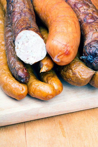 istock sausage on a wooden background 624097922