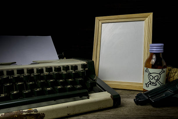 istock Typewriter with paper page and poison and gun. Concept 624098014