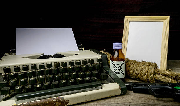 istock Typewriter with paper page and poison and gun. Concept 624098058