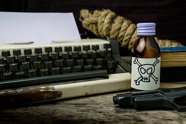 istock Typewriter with paper page and poison and gun. Concept 624098064