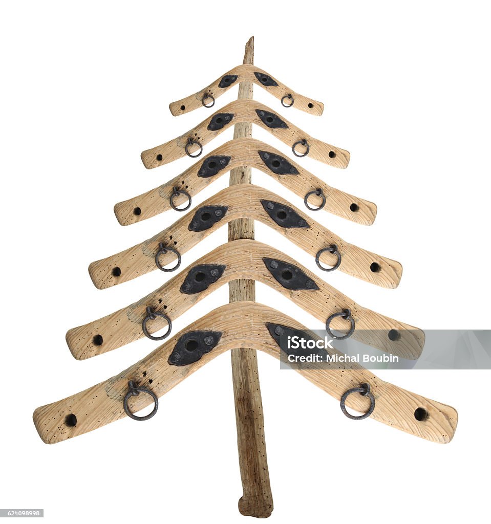 Bizarre Christmas tree from the old yokes Bizarre Christmas tree from the old yoke of a piece of wood on white background Christmas Tree Stock Photo