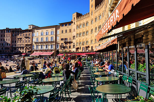 Medieval tower and buildings, Florence, Bike packing Tuscany, from the hills of Poggibonsi to the vineyards of Castellina in Chianti and Radda in Chianti
