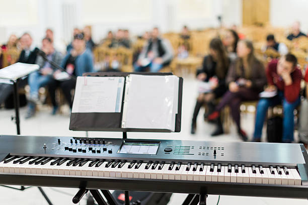 istock Keyboard or electric piano on stage at live concert 624100006