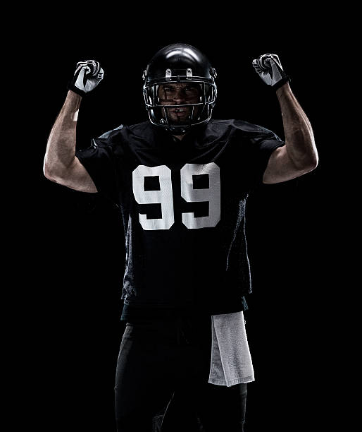 istock American football player cheering 624101256