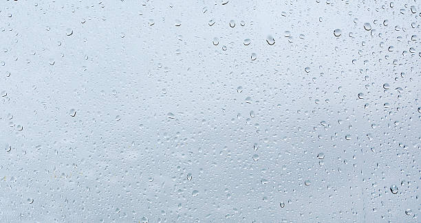 istock Drops of rain on a window glass 624109612