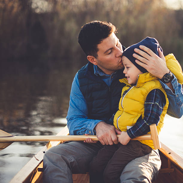 istock Enjoying boat ride with dad 624110900