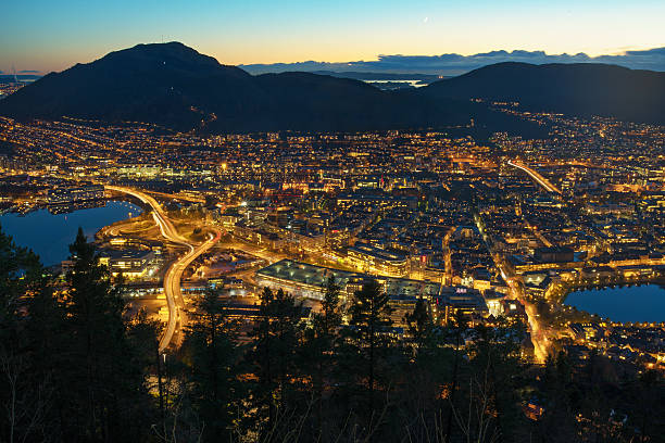 istock Panoramic aerial view on illuminated Bergen City at dusk, Norway 624111266