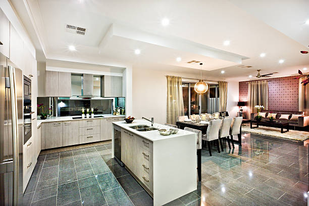 istock Modern and shiny kitchen with dining and living area 624111652