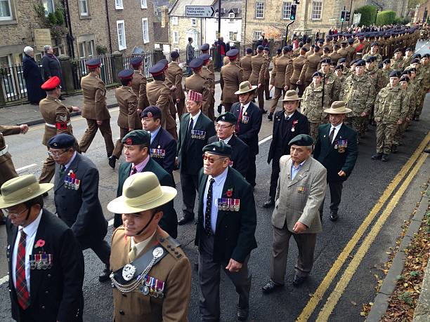 Soldiers, veterans and cadets marching Richmond, North Yorkshire, England, UK, 13th November 2016: Remembrance ceremony for those who have fallen in wars in which the UK was involved, up to the present date. mcdermp stock pictures, royalty-free photos & images