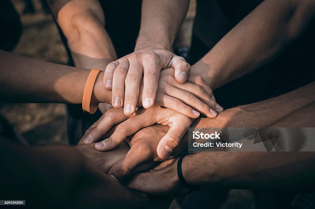 Teamwork Join Hands Support Together Concept. Sports People Joining Hands. Unity Stock Photo