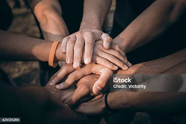 Teamwork Join Hands Support Together Concept Sports People Joining Hands Stock Photo - Download Image Now