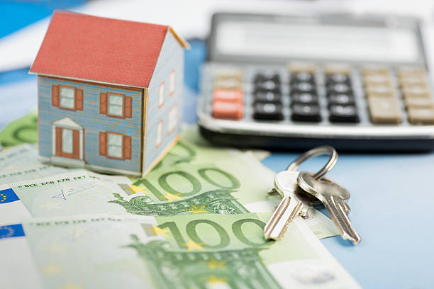 концепция домовладения и евро - loan house calculator currency стоковые фото и изображения