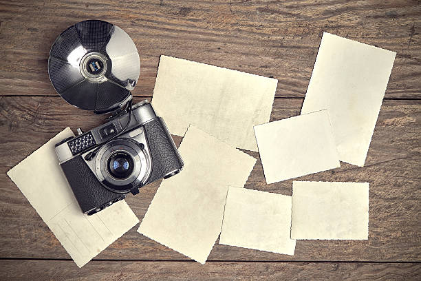 istock Vintage camera with photoframes 624125278