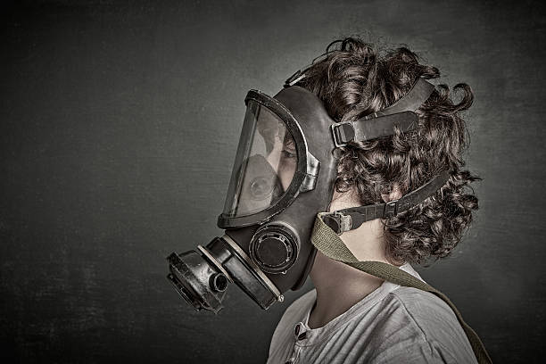 istock Child wearing a gas mask 624126018