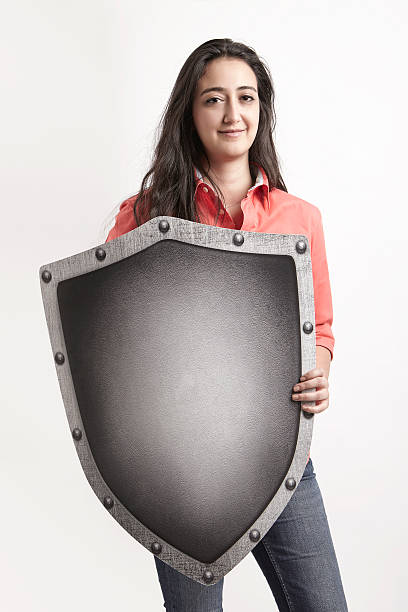 istock Woman protecting herself with a shield 624127286