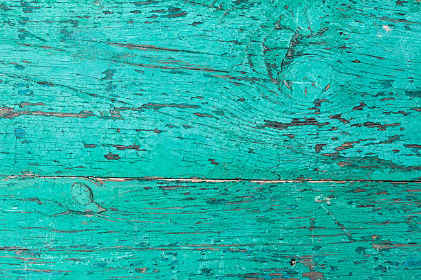 istock Background from boards painted in turquoise color 624128018