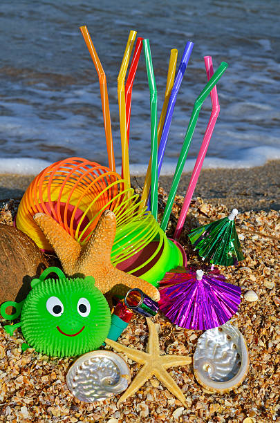 istock Party decorations on the beach. Starfish, shells, candies. 624131482