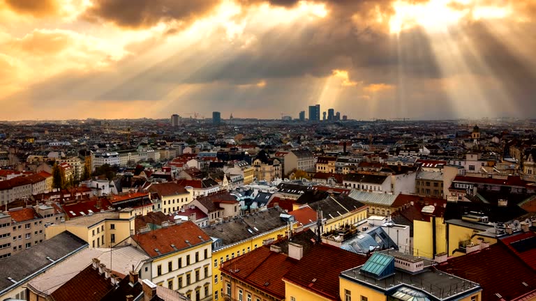 Time Lapse HD: Cityscape of Vienna with moving clouds, zoom in