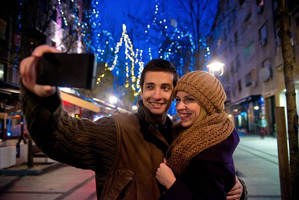 istock Couple having fun outdoors in winter city 624138786