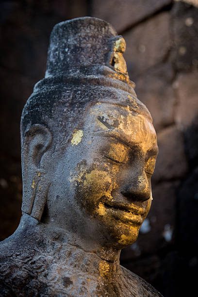istock An ancient old Buddha statue( Guan Yin ) in Mueang 624139092