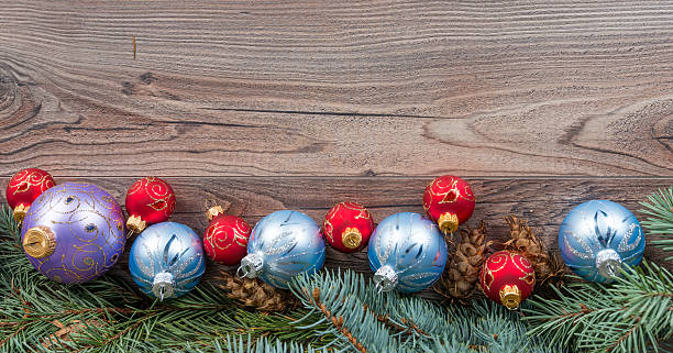 istock Christmas background with decorations on wooden board 624141104