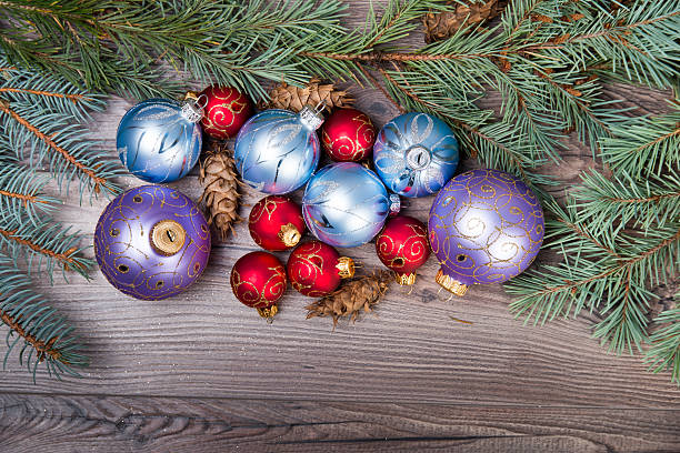 istock Christmas background with decorations on wooden board 624141214