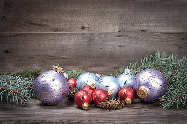 istock Christmas background with decorations on wooden board 624141288