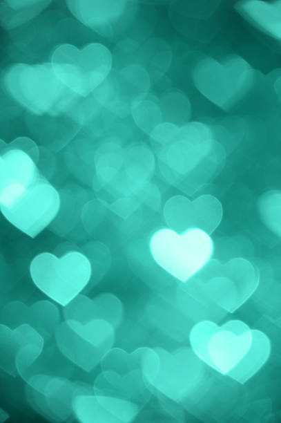 istock emerald heart bokeh background photo, abstract holiday backdrop 624147468