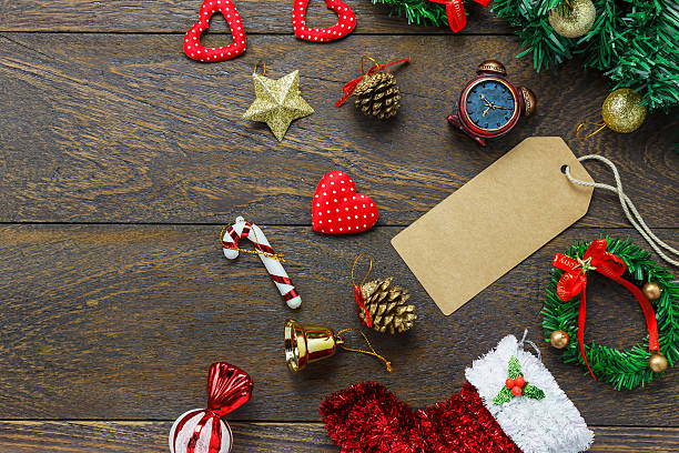 istock greeting card with Christmas decoration on wooden table background 624147782